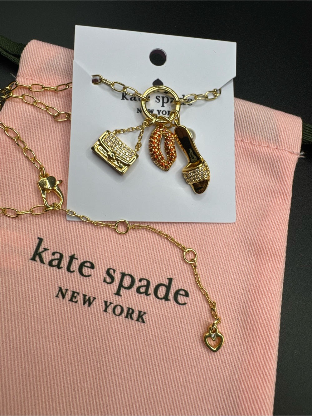 kate spade Gold Charm Necklace with Pink and Orange Accents (lips, bag charm)